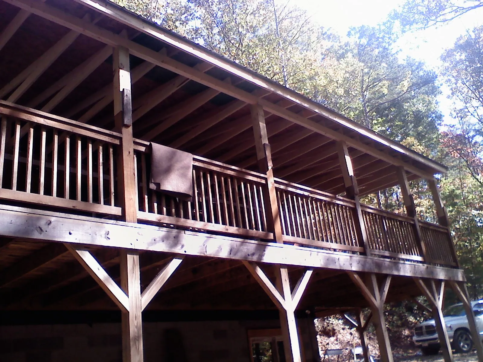 Timber framing under a new elevated porch and deck — Roof Leak Repair in Upton by Roofing Brothers
